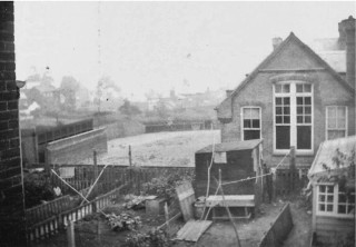 Back gardens of Nos 26 and 24 Queens Road 1894 showing the Phillip Road School to the rear. | Wivenhoe Memories Collection