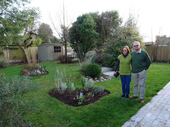 Carmen Li Lau with her husband Bob in their 'transformed' garden. | Peter Hill