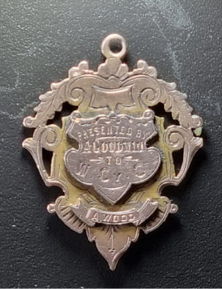 Medal presented to Arthur Wood on 7th July 1897 on winning the first race held by the Wivnhoe Cycling Club | John Foster